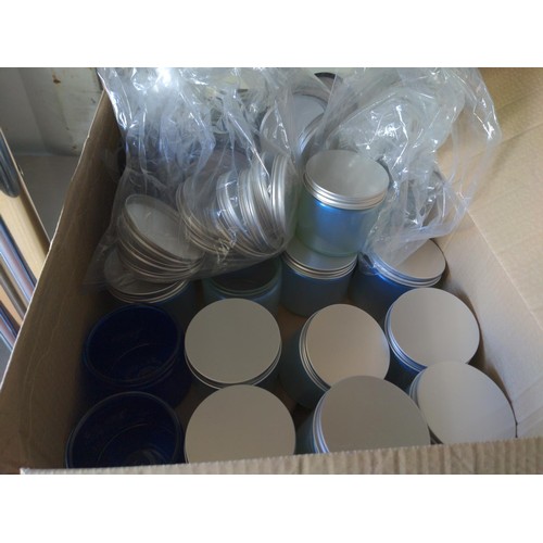 227 - Box of iridescent glass jars, some with lids, and box of small glass shot-type glasses