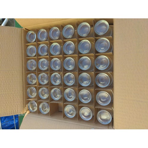 227 - Box of iridescent glass jars, some with lids, and box of small glass shot-type glasses