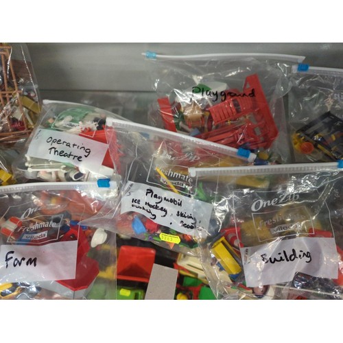 758B - Playmobile bundle over 2 shelves including figures, vehicles and accessories.