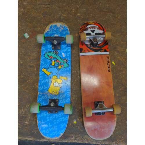 276 - Two skate boards with individual logos.&nbsp;