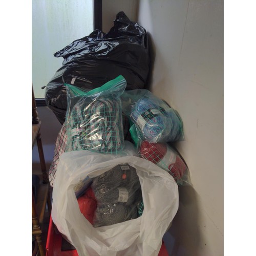 280 - Four large bags of  yarn, inc. Braemar wool