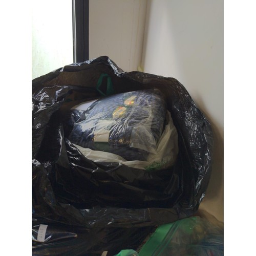 280 - Four large bags of  yarn, inc. Braemar wool