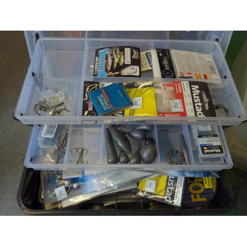 295 - Quantity of fishing tackle in box, rod and Fladen reel.