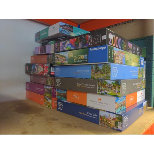 308 - Collection of 14 different jigsaw puzzles. 