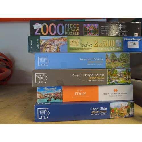 308 - Collection of 14 different jigsaw puzzles. 