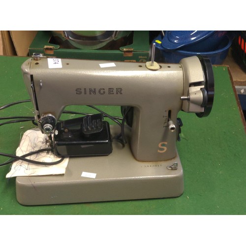 374 - Singer EX143018 sewing machine with lead and pedal.