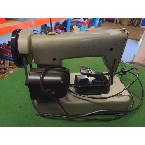 374 - Singer EX143018 sewing machine with lead and pedal.