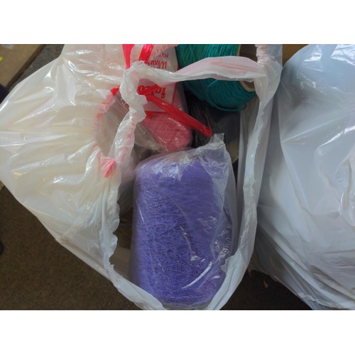 377A - Three bags of coned yarn in mixed colours,