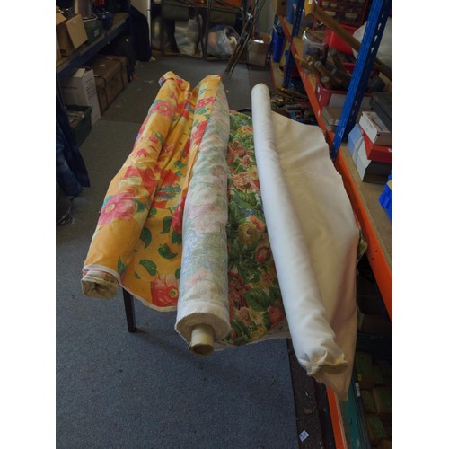 404 - 3 rolls of mixed fabric inc, floral.