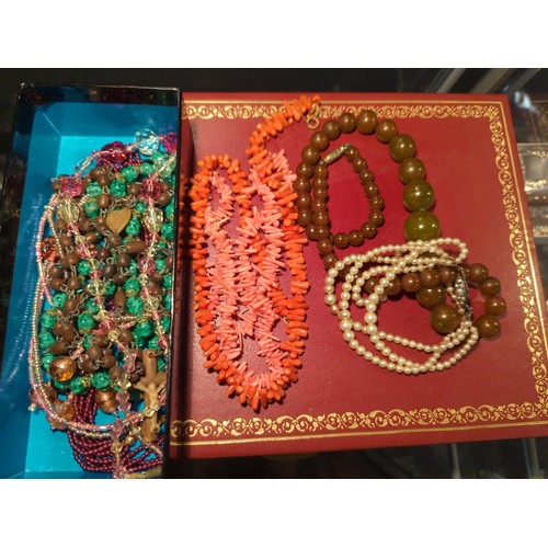 636 - Two coral necklaces, together with various beaded necklaces and a bracelet