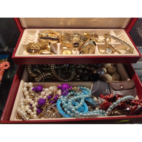 637 - Red jewellery box containing costume jewellery and watches