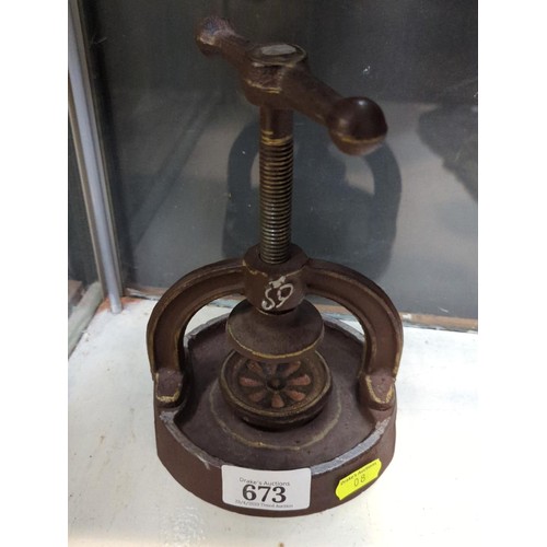 673 - Cast iron nut cracker with catcher