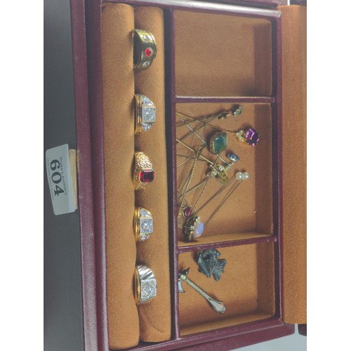 604 - Collection of jewellery including some yellow metal stickpins, two silver badges & costume jewel... 