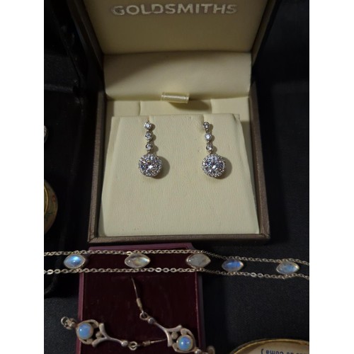 634 - 925 silver and moonstone bracelet and three pairs of 925 stone set earrings, together with a pair of... 