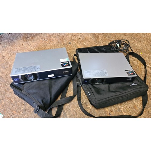 263 - 2 Sony 3LCD XGA Projectors and presentation screen all in original bags.