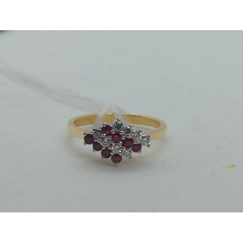 633 - 18ct gold, diamond and ruby cluster ring, size N1/2, gross weight 3.66 grams