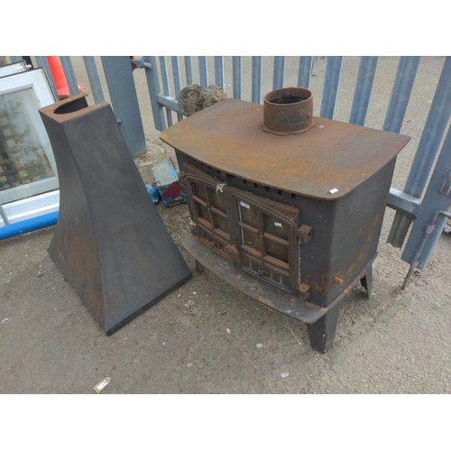 1 - Large cast woodburner. Full service and inspection required before use. W79cm. Includes hood.