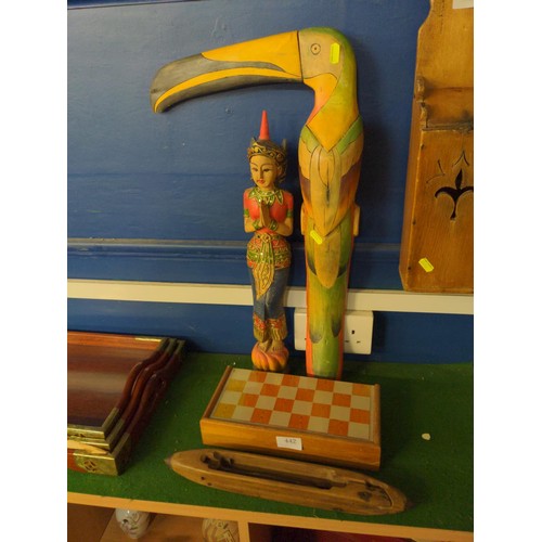 442 - Weaving shuttle, chess/ backgammon set with 2 eastern carvings. Toucan height 61cm