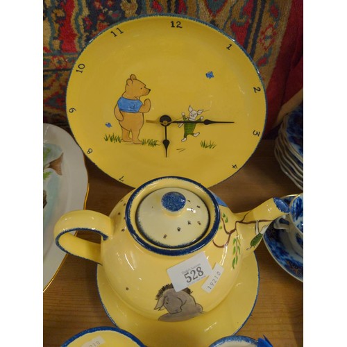 528 - Gabriella Shaw Winnie the Pooh themed ceramics inc. teapot, mugs, clock etc.