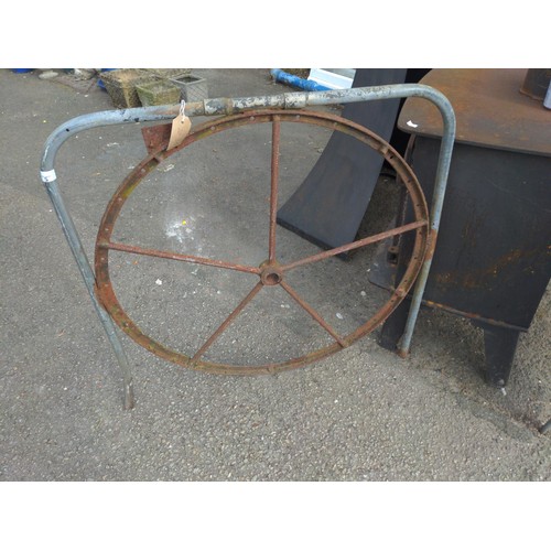 5 - Vintage wheel in railing. W85cm H90cm