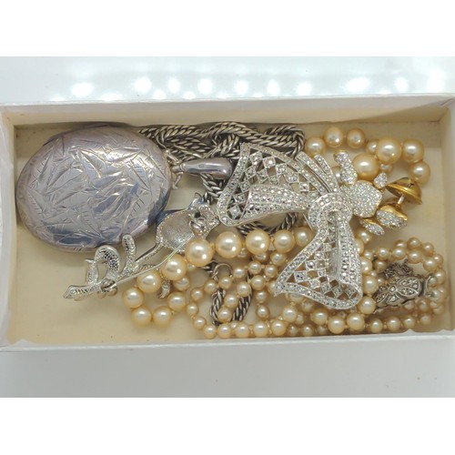 630 - Hallmarked silver locket and silver chain, silver clasped simulated pearl necklace and three novelty... 