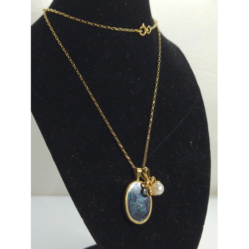 636 - Two 9ct pendants and 9ct gold neck chain, the pendants set with an onyx and opal plaque and a cultur... 