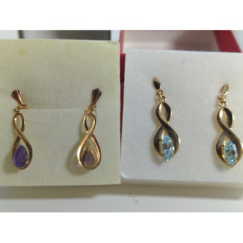 639 - Two pairs of 9ct gold stone set pendant earrings, gross weight 1.23 grams