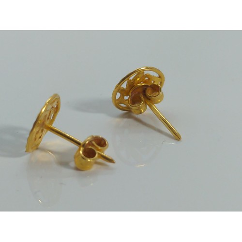 640 - Pair of 22ct gold ear studs, gross weight 1.5 grams