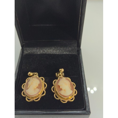 642 - Pair of 9ct gold and cameo pendant earrings, length 23mm, gross weight 3.57 grams