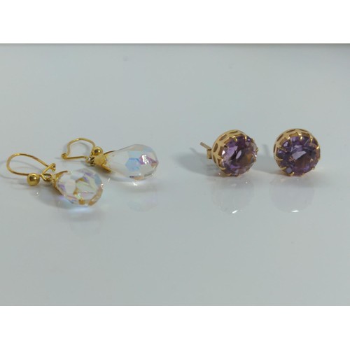 643 - Two pairs of 9ct gold and coloured stone set earrings, gross weight 5.34, one butterfly deficient