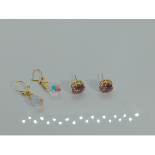 643 - Two pairs of 9ct gold and coloured stone set earrings, gross weight 5.34, one butterfly deficient