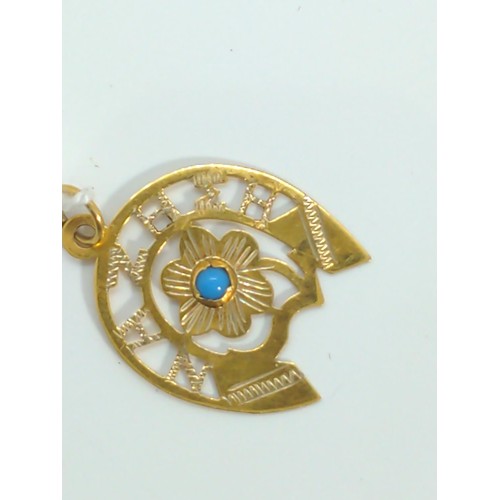 645 - 9ct gold horse shoe pendant 'NAZHEH', set with turquoise, gross weight 1.15 grams