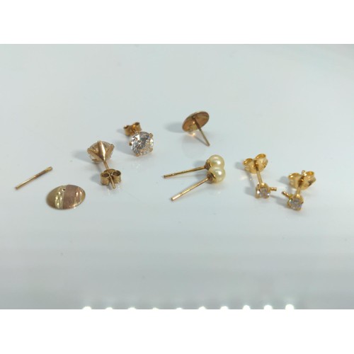 654 - Pair of scrap 18ct gold white stone set ear studs, gross weight 0.59 gram, pair of 9ct gold and whit... 