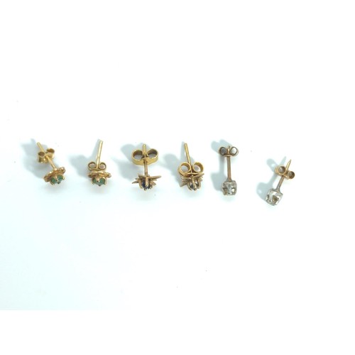 658 - Three pairs of 9ct gold and gem-set ear studs, set with emerald, sapphire and diamonds respectively,... 