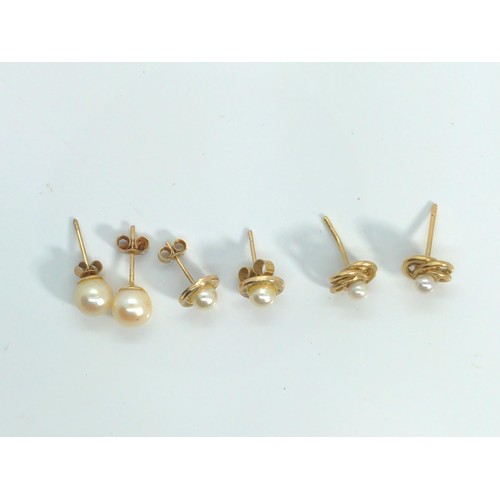 660 - Three pairs of cultured pearl ear studs, two set with 9ct gold and one with yellow metal testing pos... 