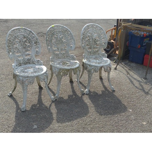 97 - 3 cast aluminium garden bistro chairs