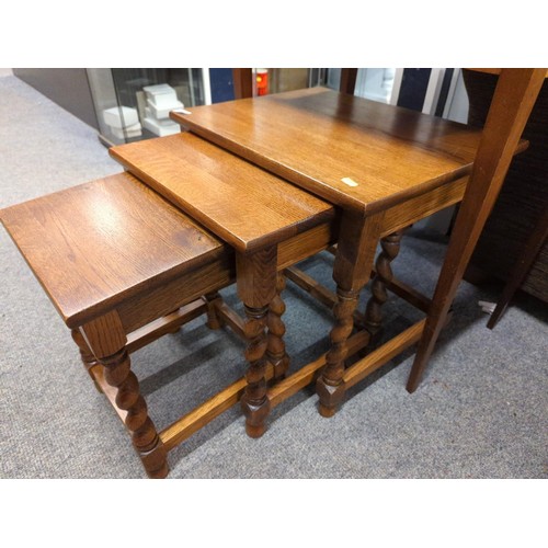 955 - Nest of three oak occasional barley twisted tables. Largest W51 D40 H 46 cm