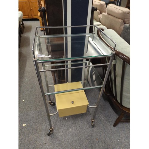 970 - Glass and metal medical trolley with two shelves and lower compartment on castor wheels W44 D35 H 90... 