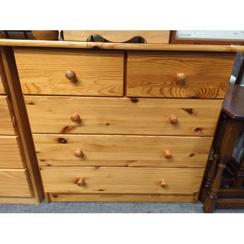 975 - Two over three drawer pine chest of drawers. W79cm H76cm