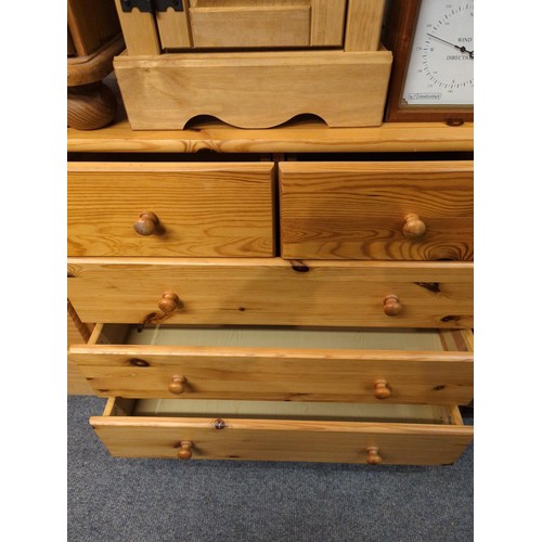 975 - Two over three drawer pine chest of drawers. W79cm H76cm