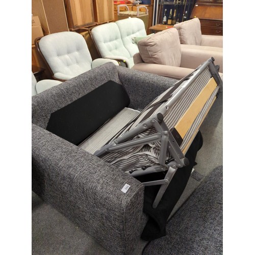 986 - Large snuggle chair/single sofa bed in charcoal tweed style upholstery. W125 D95 H70 (Measurements a... 