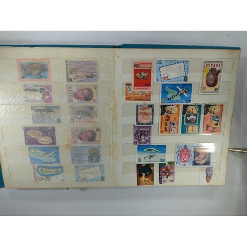 603 - Netto blue stamp album including mint and used world stamps