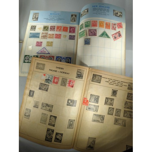 604 - Five stamp albums containing used world stamps, two part filled, and a booklet