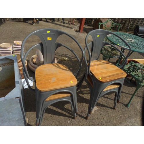 102 - 4 stacking cafe style chairs