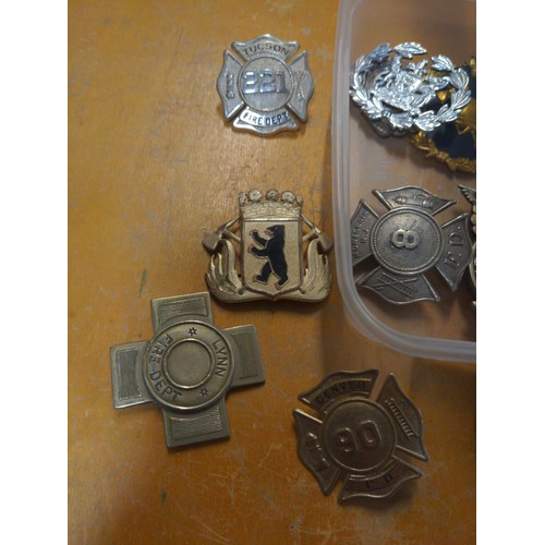 576 - Large collection of US Fire Department badges