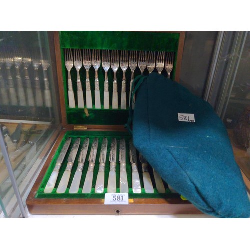 581 - Boxed set of twelve mother-of-pearl handled silver plated dessert forks and knives, together with si... 