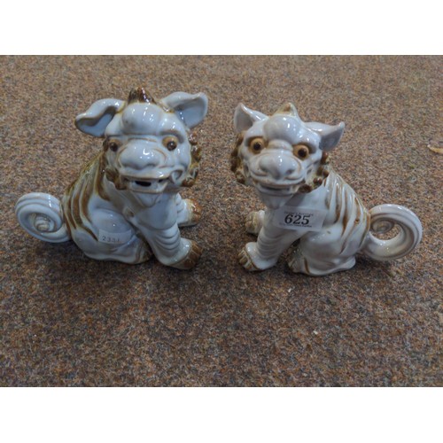 625 - Pair of Foo Dogs in ceramic markings to base.