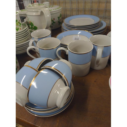 658 - Doulton ware white and blue with gilding, 4 place setting.