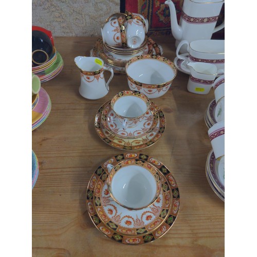 665 - Royal Albert tea ware with cups and saucers and plates with a milk jug and sugar bowl.