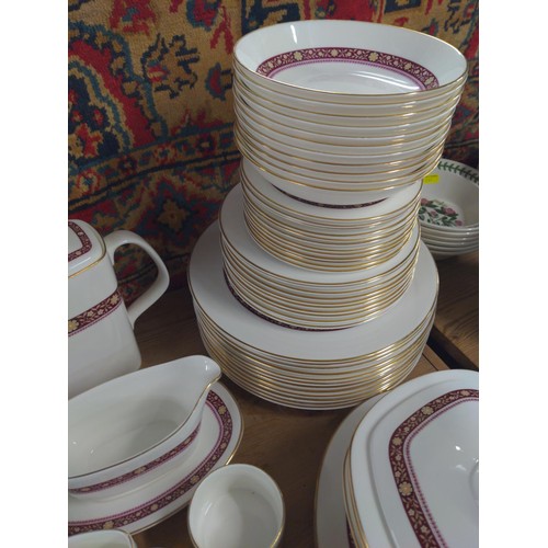 666 - Royal Doulton, Minuet H.5026 Dinner and tea/coffee ware with red and gilding banding design. Dinner ... 